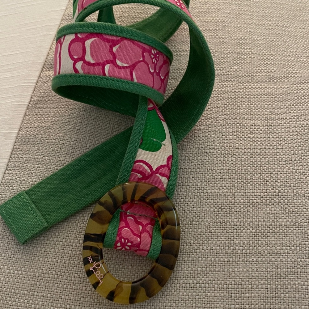 Lilly Pulitzer fabric belt with a tortoise-shell style ring buckle.